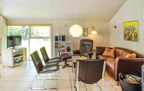 Μια τηλεόραση ή/και κέντρο ψυχαγωγίας στο Holiday Home Grønsalsager