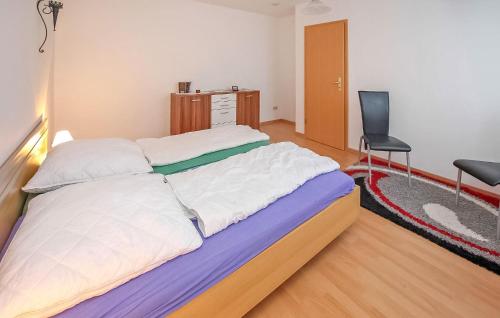 Postel nebo postele na pokoji v ubytování Ferienwohnung Ostseebad Breege