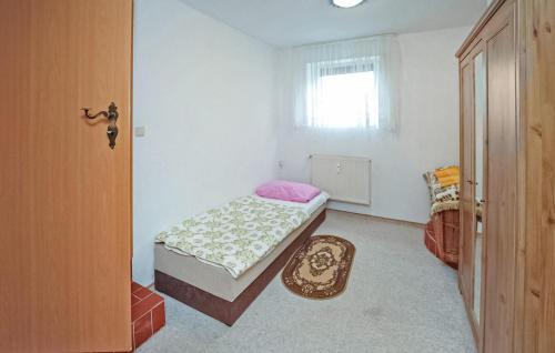 Postel nebo postele na pokoji v ubytování Ferienwohnung Ostseebad Breege