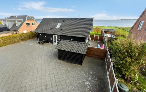 an aerial view of a house with a patio at Lovely Home In Fur With Sauna in Fur