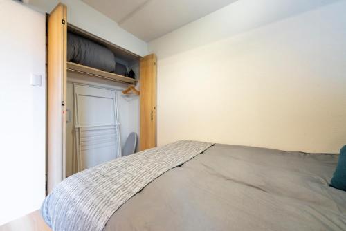 Ein Bett oder Betten in einem Zimmer der Unterkunft Unify