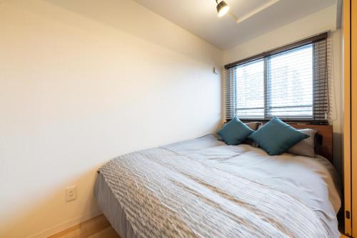 Ein Bett oder Betten in einem Zimmer der Unterkunft Unify