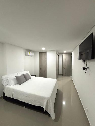 Postel nebo postele na pokoji v ubytování Apartamento de playa Ocean Drive