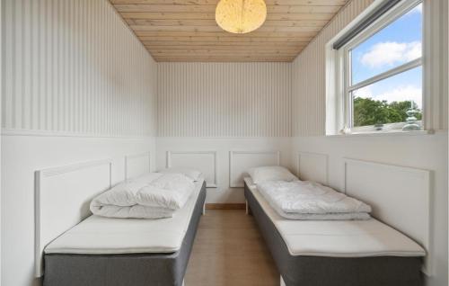 Cama o camas de una habitación en 3 Bedroom Beautiful Home In Farsø