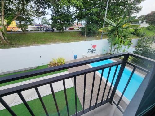 a balcony with a view of the street at Ipoh Eden Pool Villa Suites in Ipoh