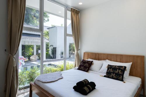 Ένα ή περισσότερα κρεβάτια σε δωμάτιο στο CLEOPATRA POOL VILLA I Prime Location - Near The Famous Night Bazzar, 5 Minutes from the old city I Daily Housekeeping