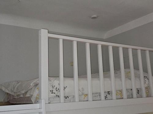 Ένα ή περισσότερα κρεβάτια σε δωμάτιο στο Cozy design studio