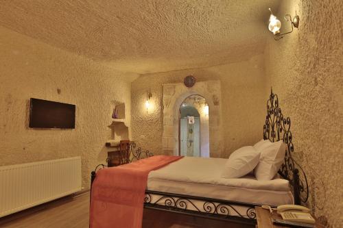 Μια τηλεόραση ή/και κέντρο ψυχαγωγίας στο Jacob's Cave Suites - Cappadocia