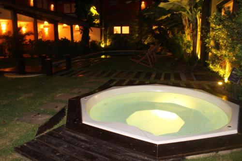 Jardín al aire libre en Pousada Tatuapara
