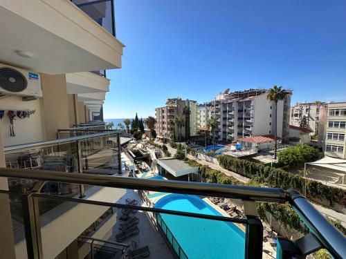 a balcony with a view of a city at Monte Carlo Hotel in Alanya