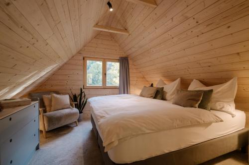Postel nebo postele na pokoji v ubytování Chalet Tré
