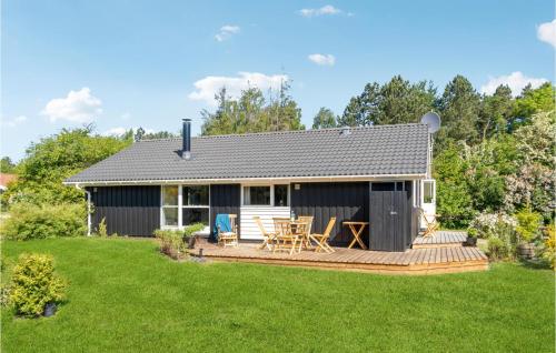 Κήπος έξω από το Three-Bedroom Holiday Home In Asnas