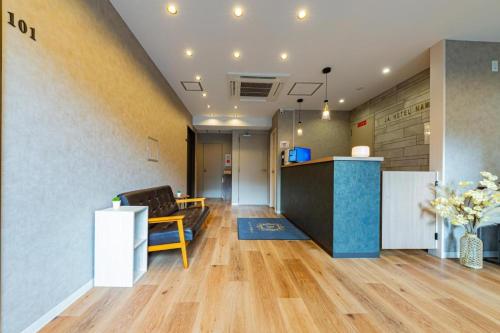 an office with a reception desk and a lobby at JA Hotel Namba in Osaka