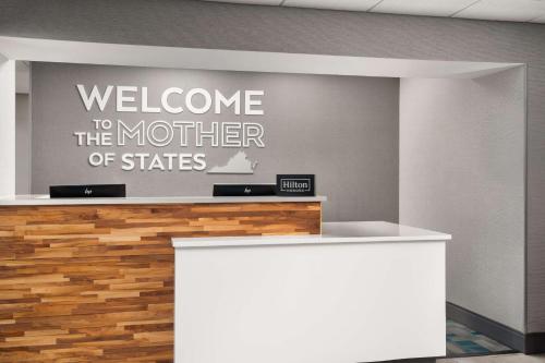 a welcome to the mother of states sign on a wall at Hampton Inn Roanoke/Hollins - I-81 in Roanoke