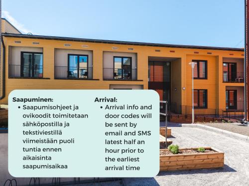 a building with a sign in front of it at Hiisi Homes Turku Fleminginkatu in Turku