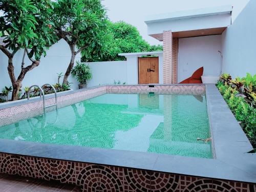 Piscine de l'établissement Privat Pool Villa at Kuta ou située à proximité