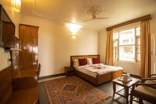 Кровать или кровати в номере WOW STAYZ2 Hotel The Lodge