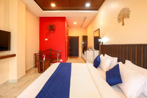 Postel nebo postele na pokoji v ubytování Coastal Grand Resorts - Akshaya
