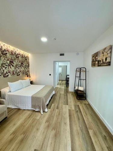 Ένα ή περισσότερα κρεβάτια σε δωμάτιο στο Solera Suites