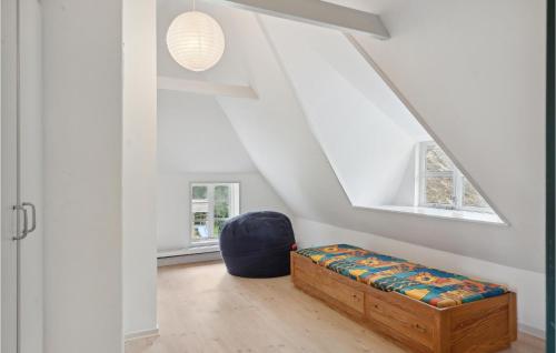 a living room with a couch and a chair at Pet Friendly Home In Vejle With Kitchen in Vejle