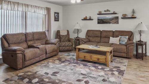 a living room with two couches and a coffee table at Hermosa Haven home in Montrose