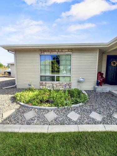 a house with a garden in front of it at Hermosa Haven home in Montrose