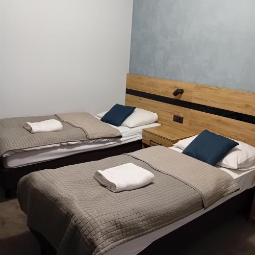 Llit o llits en una habitació de Villa Jaśmin