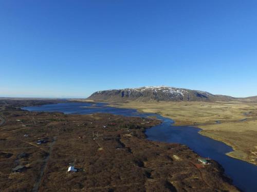 an aerial view of a river and a mountain at Prime Location-Golden Circle 3 Bedrooms in Selfoss