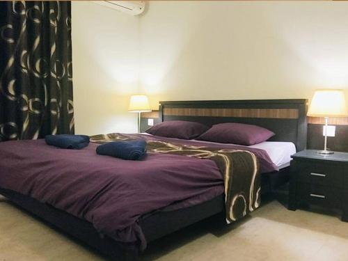 Postel nebo postele na pokoji v ubytování Riviera Hermitage Luxury