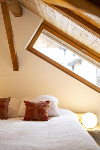 Cama o camas de una habitación en Ferienwohnung Scaletta