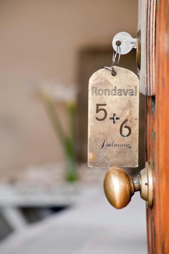 a door with a price tag attached to it at Dalmore Guest Farm in Bergville