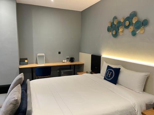 Cama o camas de una habitación en 禾楓覓月文旅