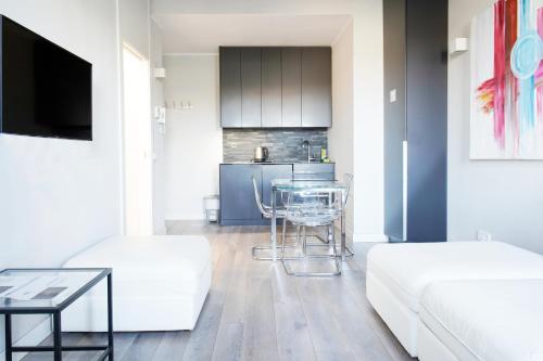 Posteľ alebo postele v izbe v ubytovaní Jewel Apartment vista Duomo 100m