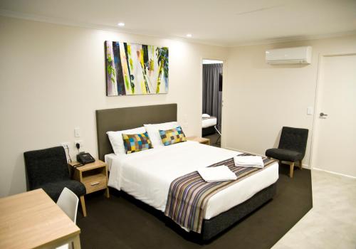 Ένα ή περισσότερα κρεβάτια σε δωμάτιο στο Roma Central Motel