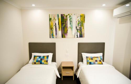 Ένα ή περισσότερα κρεβάτια σε δωμάτιο στο Roma Central Motel