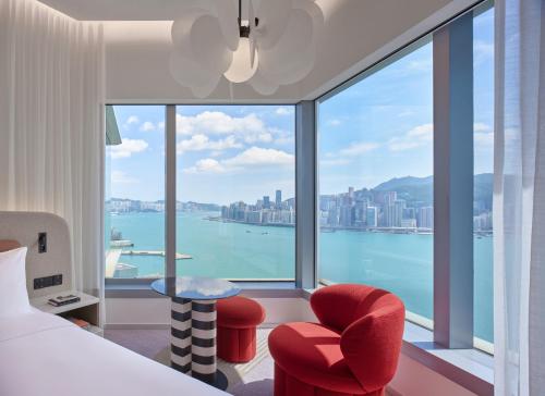 a hotel room with a view of the water at Mondrian Hong Kong in Hong Kong