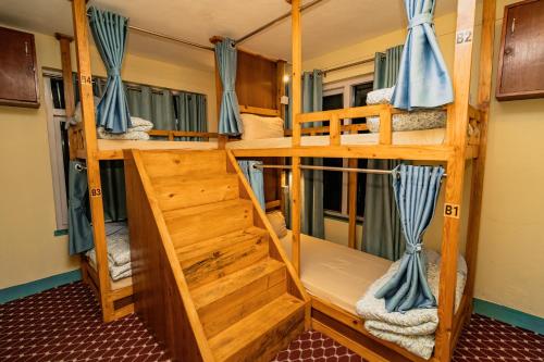 a couple of bunk beds in a room at Thamel Heritage Hostel in Kathmandu
