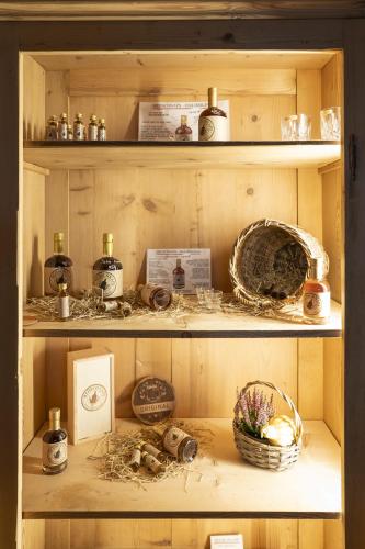 a shelf with a basket and other items on it at Drei Könige in Entlebuch