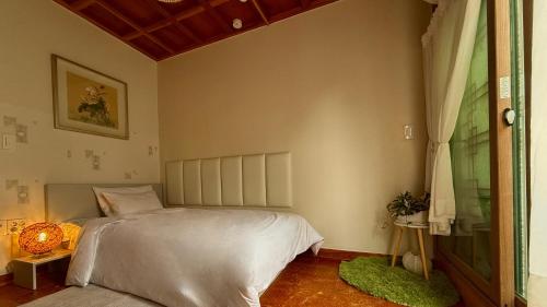 Letto o letti in una camera di Hanji Gguljam
