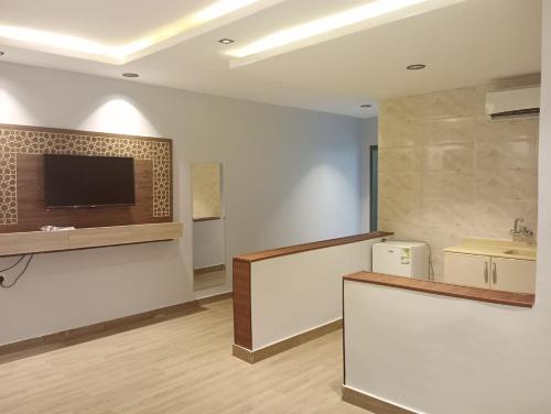 Kuchyň nebo kuchyňský kout v ubytování فندق ملاذ Malath Hotel
