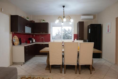 Kuchyň nebo kuchyňský kout v ubytování Villa Hara