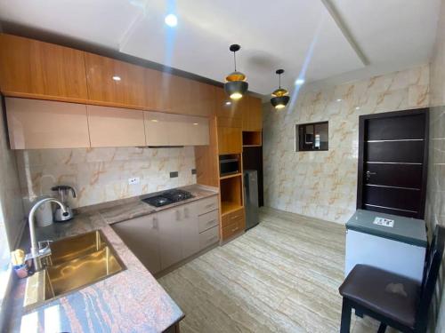 Kuchyň nebo kuchyňský kout v ubytování cozy Haven