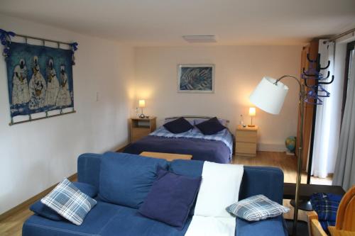 Ruang duduk di Souterain Appartement 19 min zu Fuß Downtown