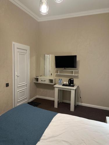 Μια τηλεόραση ή/και κέντρο ψυχαγωγίας στο Central Baku Boutique Hotel