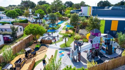 an aerial view of a playground at a park at Camping 5 étoiles - Parc aquatique - eeiade in Brem-Sur-Mer