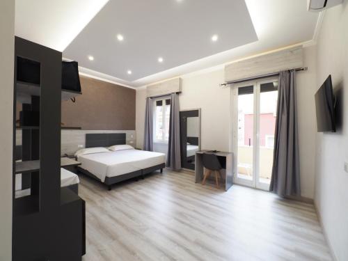 Ein Bett oder Betten in einem Zimmer der Unterkunft Hotel Osimar