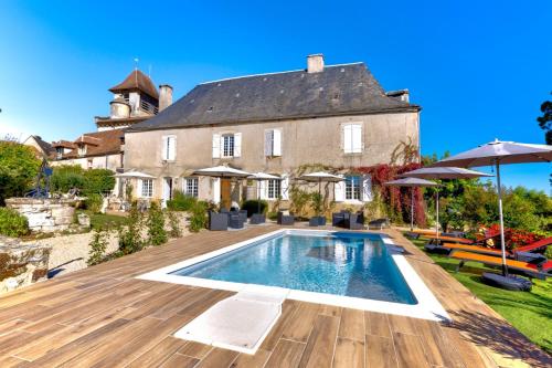 Bazén v ubytování DORDOGNE 24 Chambre d'hôtes CAMPAGNARDE Élégance Champêtre pour un séjour romantique nebo v jeho okolí