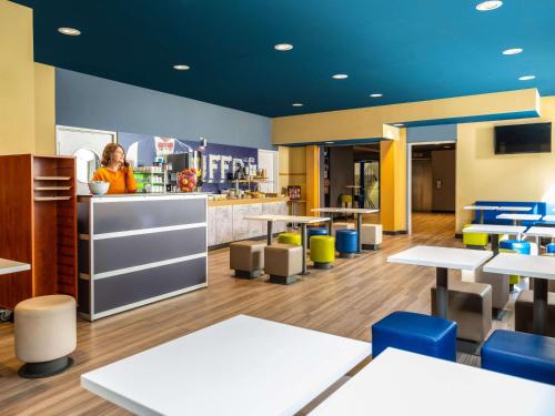 Reštaurácia alebo iné gastronomické zariadenie v ubytovaní Ibis Budget Graz City