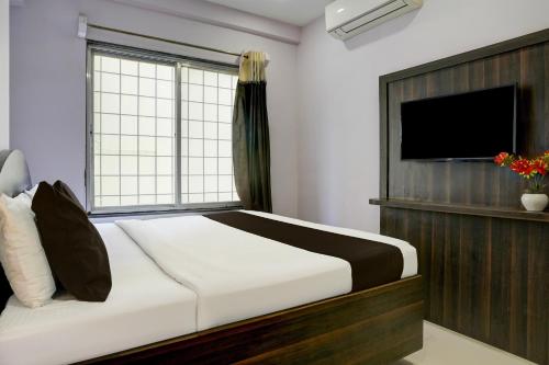 Katil atau katil-katil dalam bilik di Super Hotel O Chhatrapati Nagar