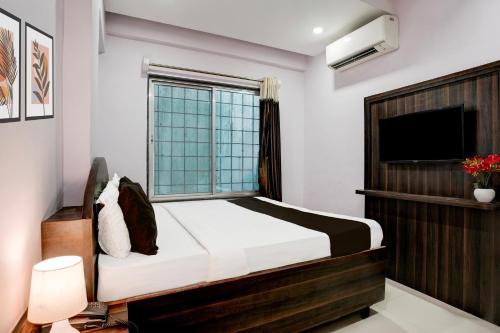 Katil atau katil-katil dalam bilik di Super Hotel O Chhatrapati Nagar